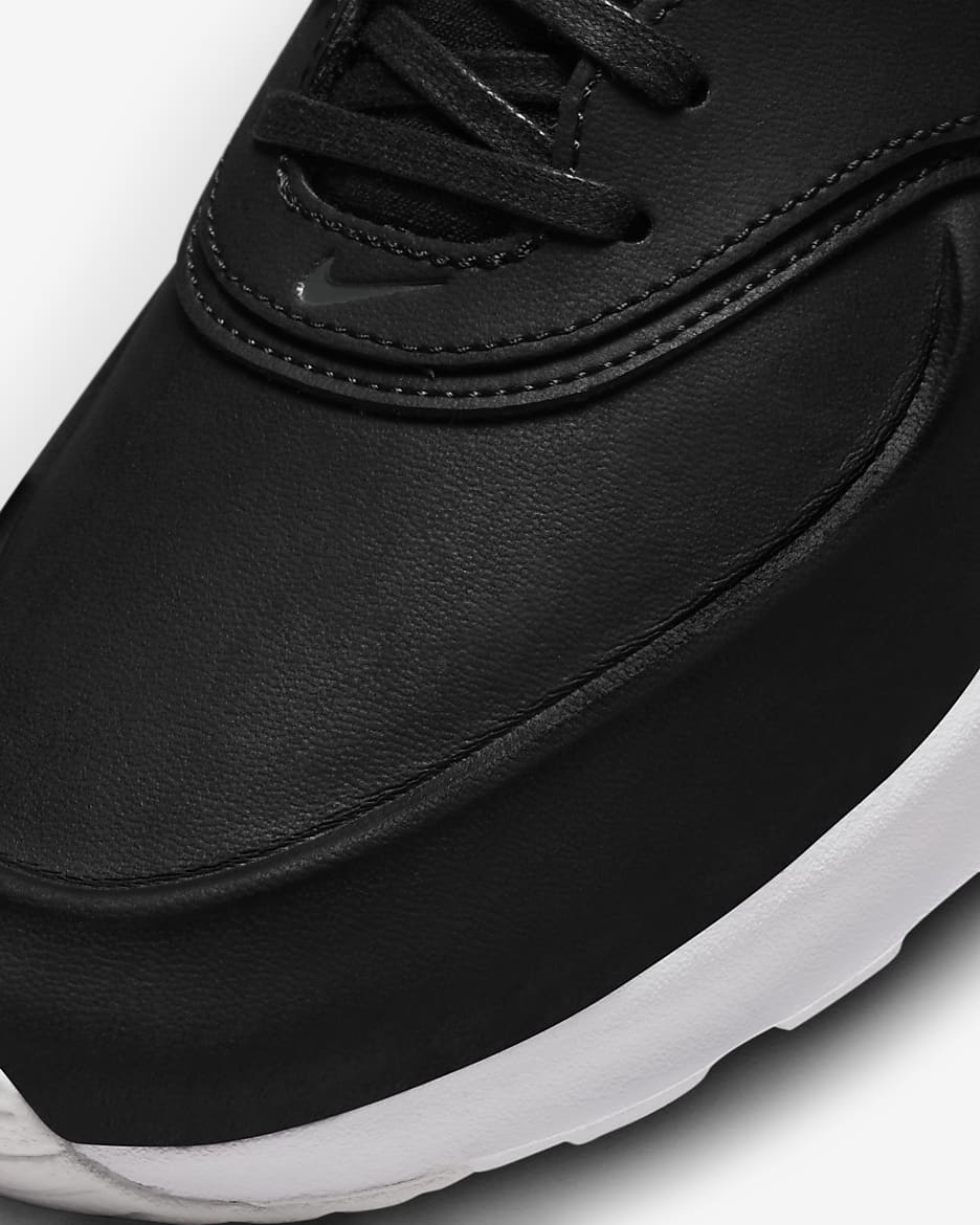 Nike thea womens black leather hotsell